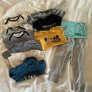 12 month bundle of cute boy onesies